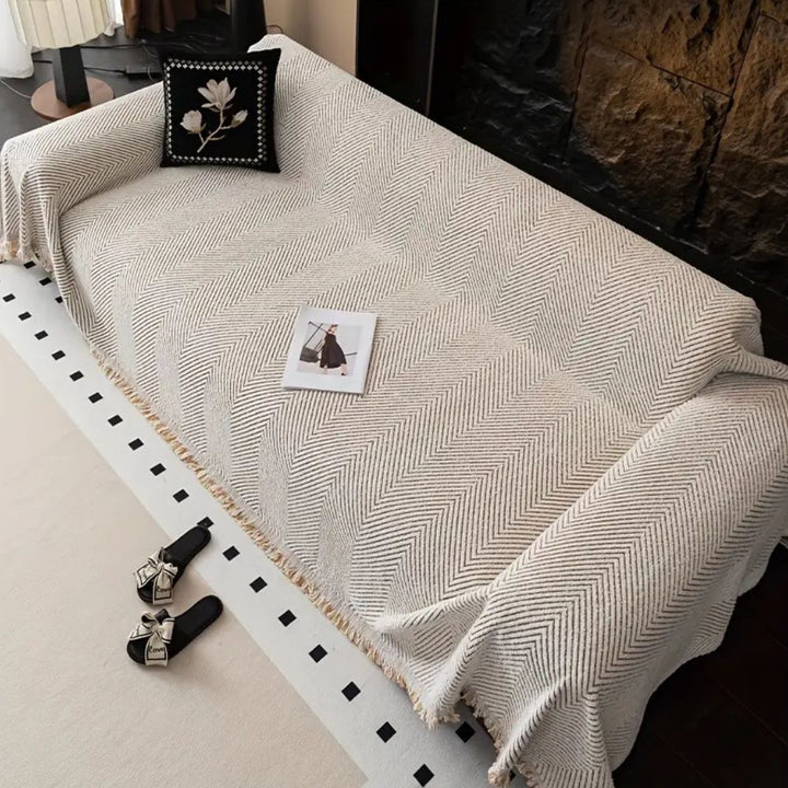 Skanto | CUSHVIVE – Herringbone Sofa Cover with Splash Protection and Non-Slip Design