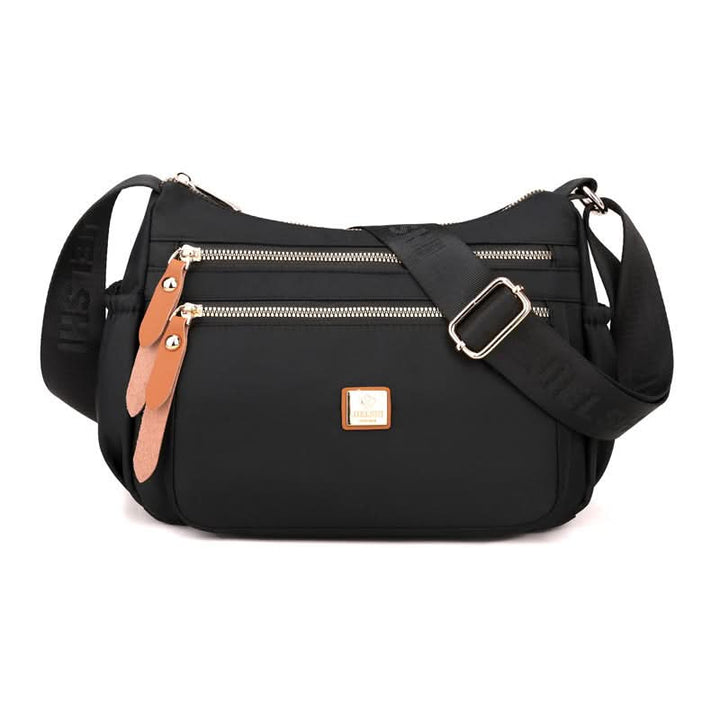 Skanto | Lettvekts nylon skulderveske med lommer