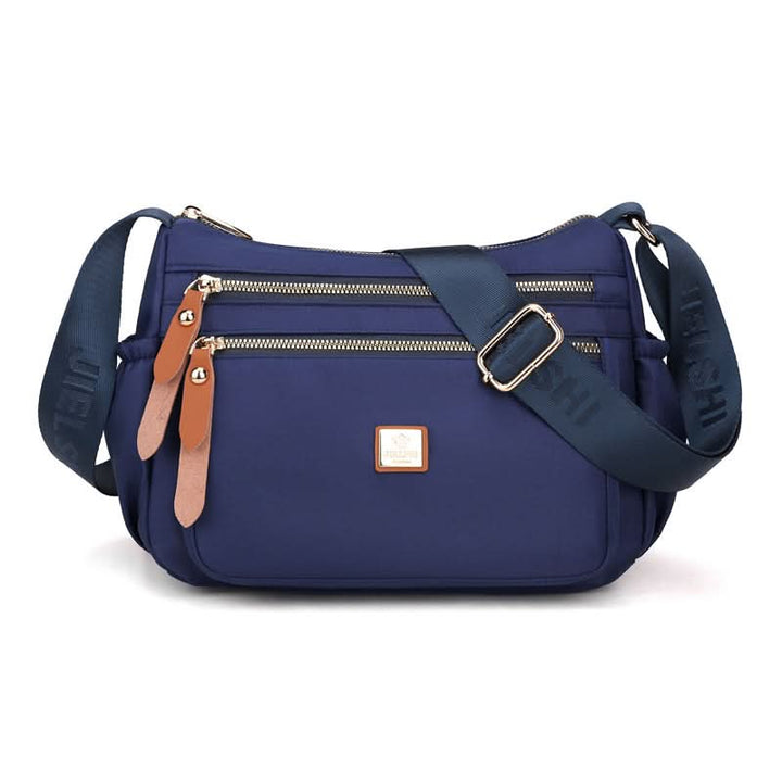 Skanto | Lettvekts nylon skulderveske med lommer