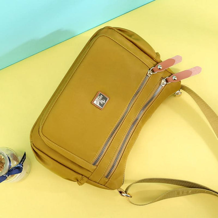 Skanto | Lettvekts nylon skulderveske med lommer
