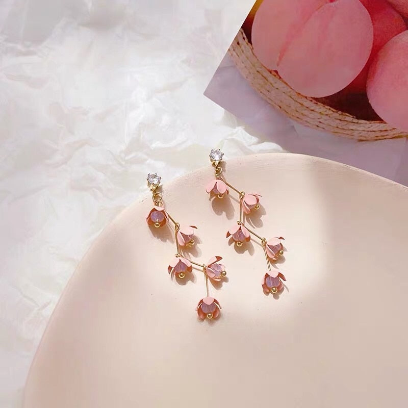 Skanto | Lange rhinestone krystall rosa sakura blomst med zircon klips øredobber