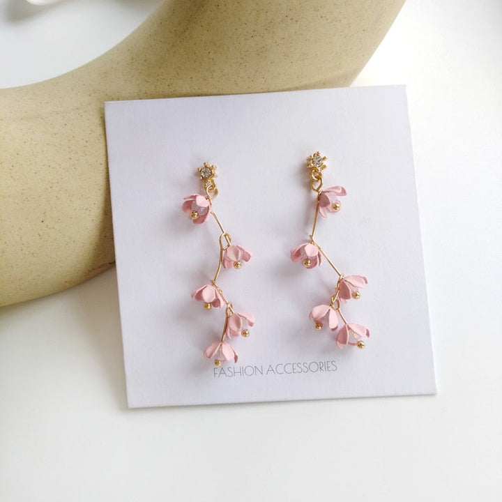 Skanto | Lange rhinestone krystall rosa sakura blomst med zircon klips øredobber