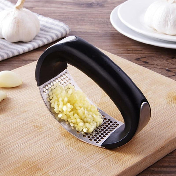 L'ail - Rocking Garlic Crusher | Skanto