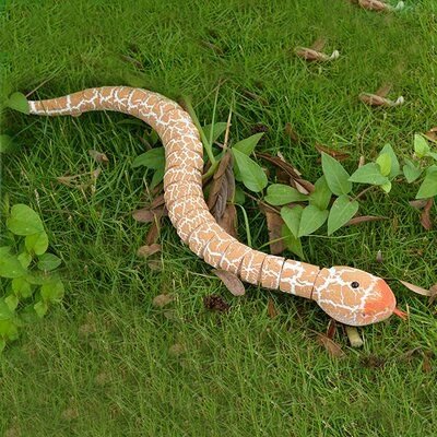 Norvo | SnakeTrick | Morsomme skremme reaksjoner garantert! - Fjernstyrt slange for spøker og spill