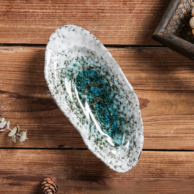 Skanto | Shellora – Elegant skallformet keramisk servise for stilfull dining