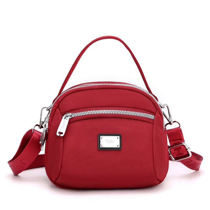 Skanto | Lett solid nylon skulderveske