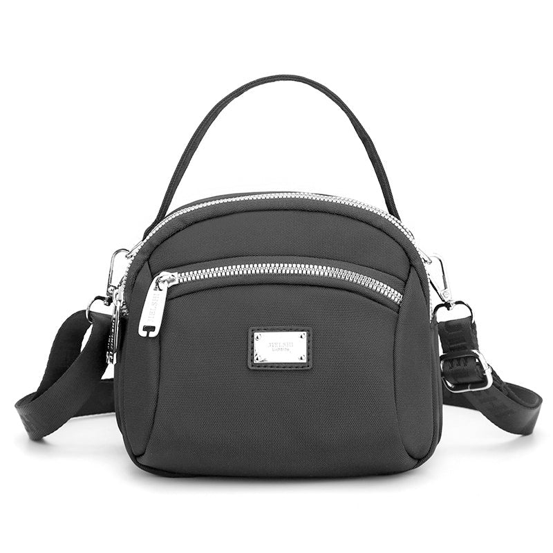 Skanto | Lys solid nylon skulderveske