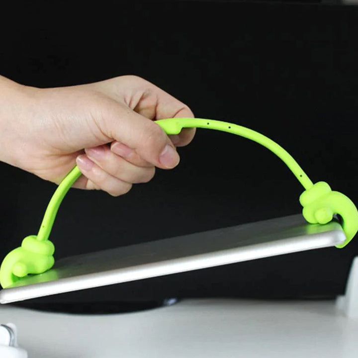 Skanto | Tommel opp-holder for mobiltelefon