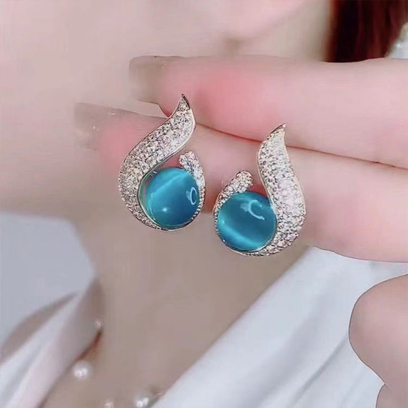 Skanto | Elegante øredobber med perleimitasjon og rhinestone