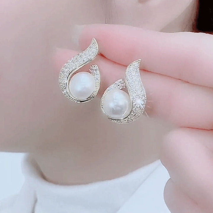 Skanto | Elegante øredobber med perleimitasjon og rhinestone