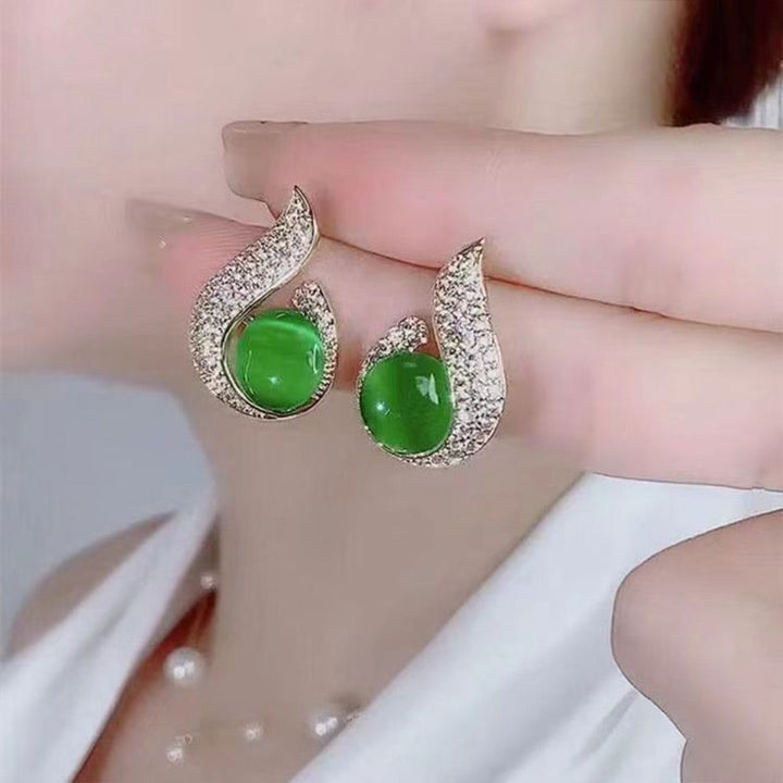 Skanto | Elegante øredobber med perleimitasjon og rhinestone