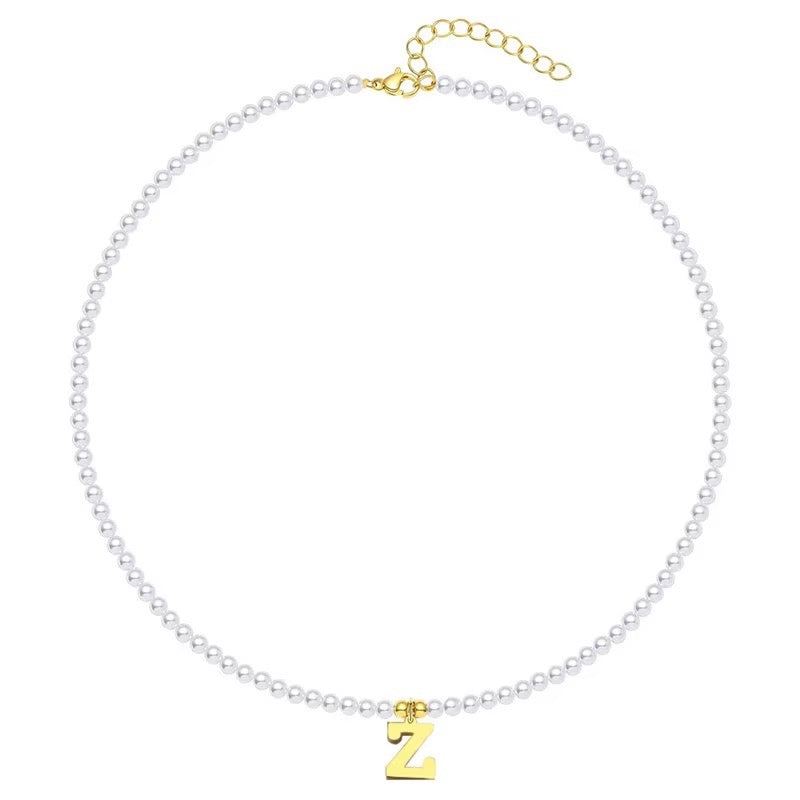 Skanto | Elegant gullbelagt perle bokstav initial halskjede